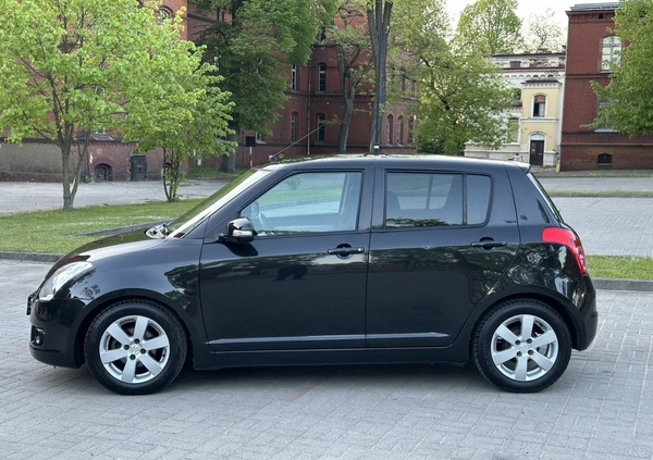 Suzuki Swift cena 16900 przebieg: 121000, rok produkcji 2009 z Gniezno małe 497